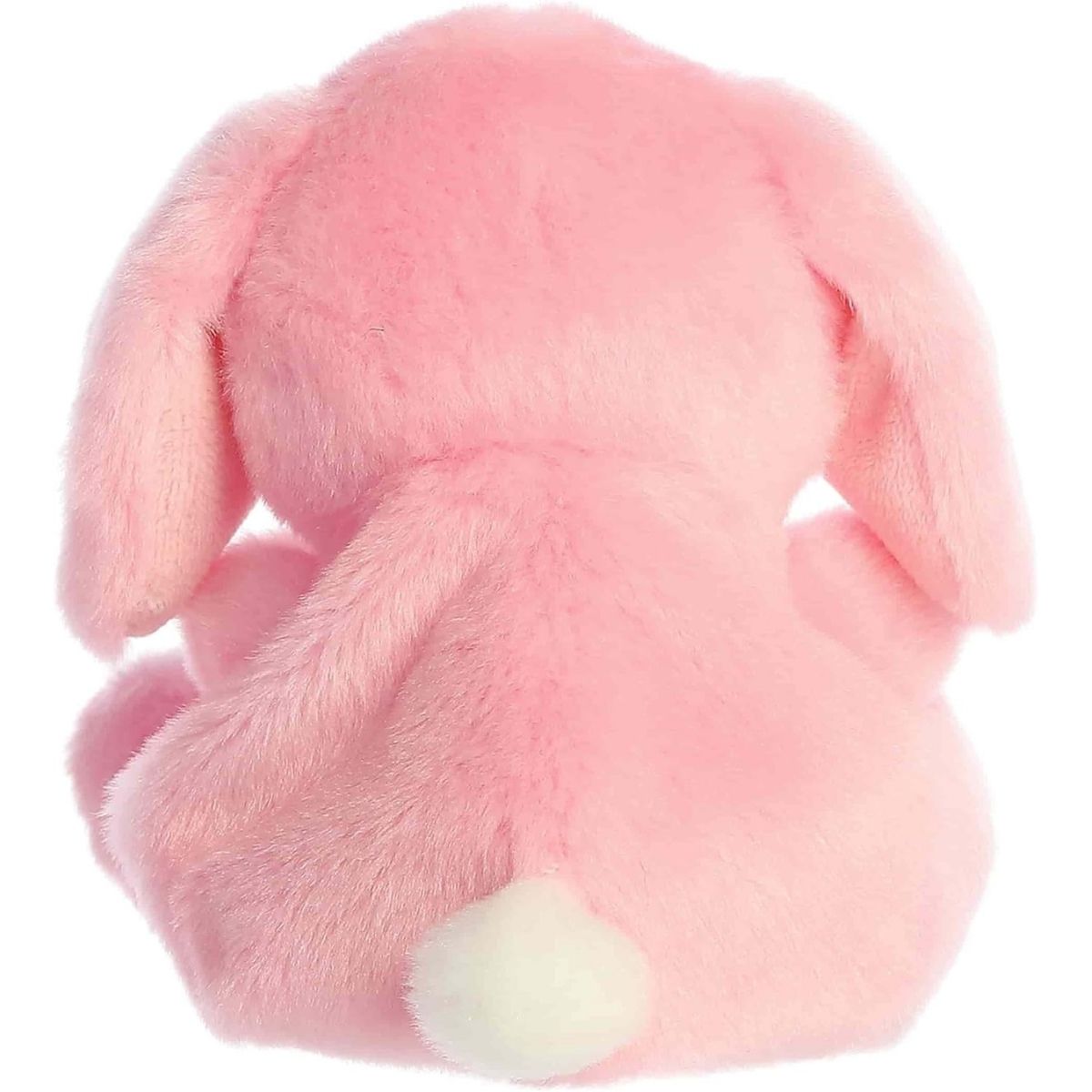 Direct back view of the cuddly pink Palm Pals bunny stuffed animal showing its fluffy white tail.