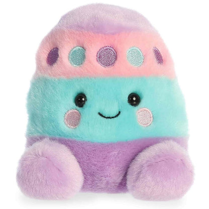 Straight-on front view of the 5-inch Aurora Palm Pals Cotton Easter Egg stuffed animal showing its pastel stripes and smiling face.