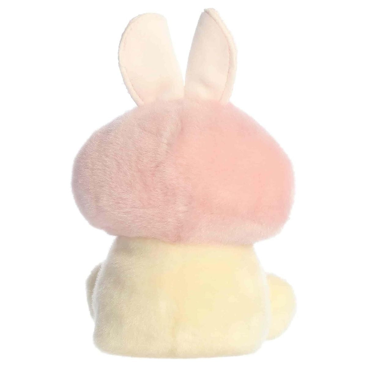 Back view of the Aurora plush showcasing the pastel pink mushroom cap, white spots, and pink bunny ears from behind.