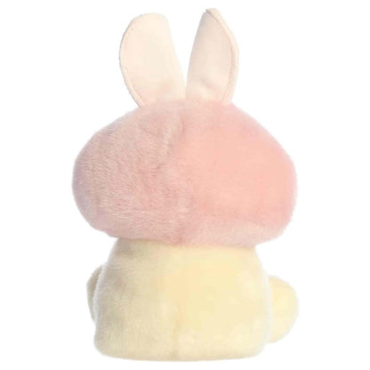 Back view of the Aurora plush showcasing the pastel pink mushroom cap, white spots, and pink bunny ears from behind.