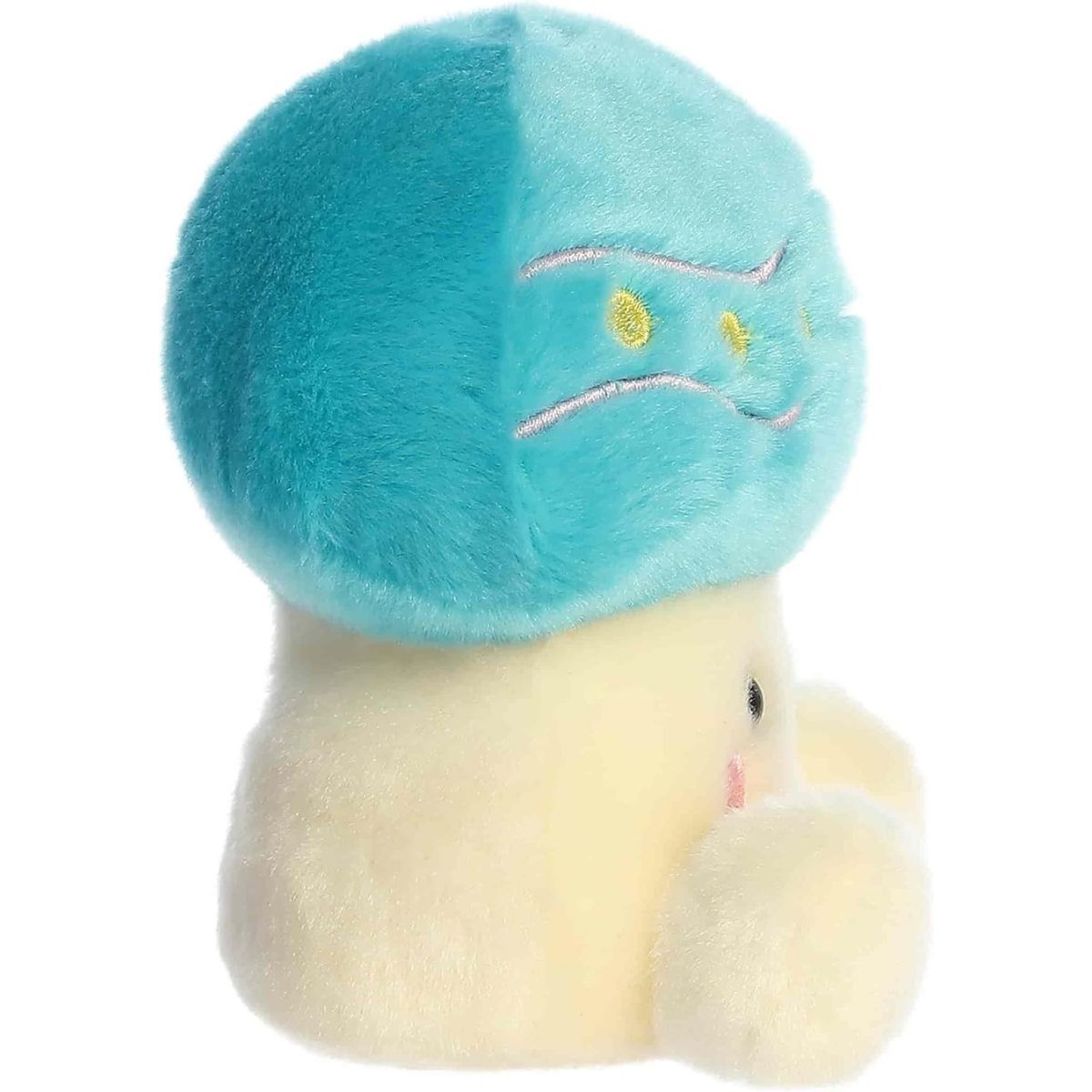 Side profile view of the Palm Pals Easter Mushroom plush highlighting its perfectly squishy round body and decorated blue cap.