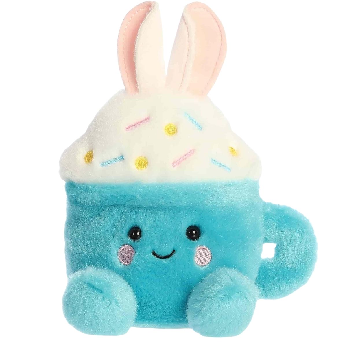 Front view of the Aurora Palm Pals 5-inch Lopi Bunny Latte plush sitting upright, showing its blue mug body, whipped cream top with sprinkles, and bunny ears.
