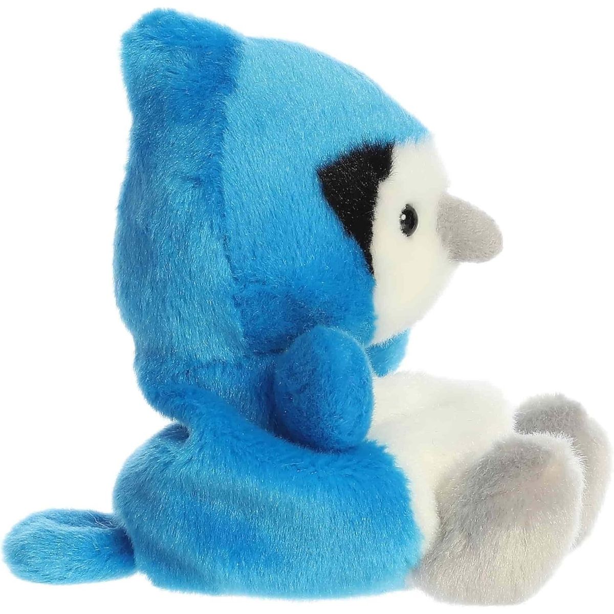 Side profile view of the Palm Pals Blue Jay plush highlighting its perfectly squishy round body, blue crest, and little tail.