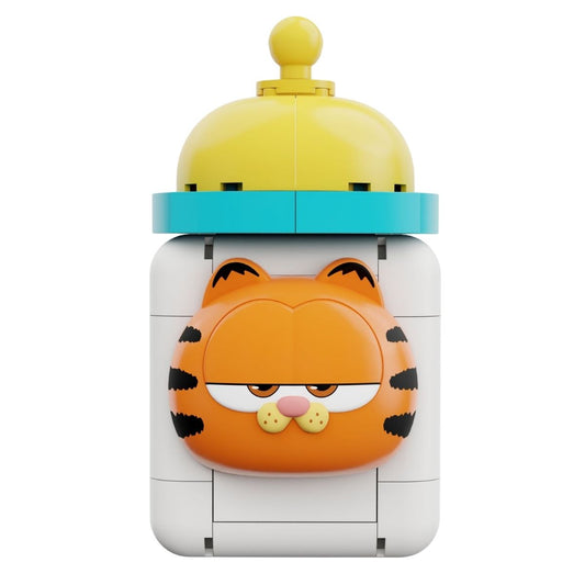 Straight-on view of the 47-piece Pantasy Garfield baby bottle magnet showing the iconic orange cat's face and yellow top.