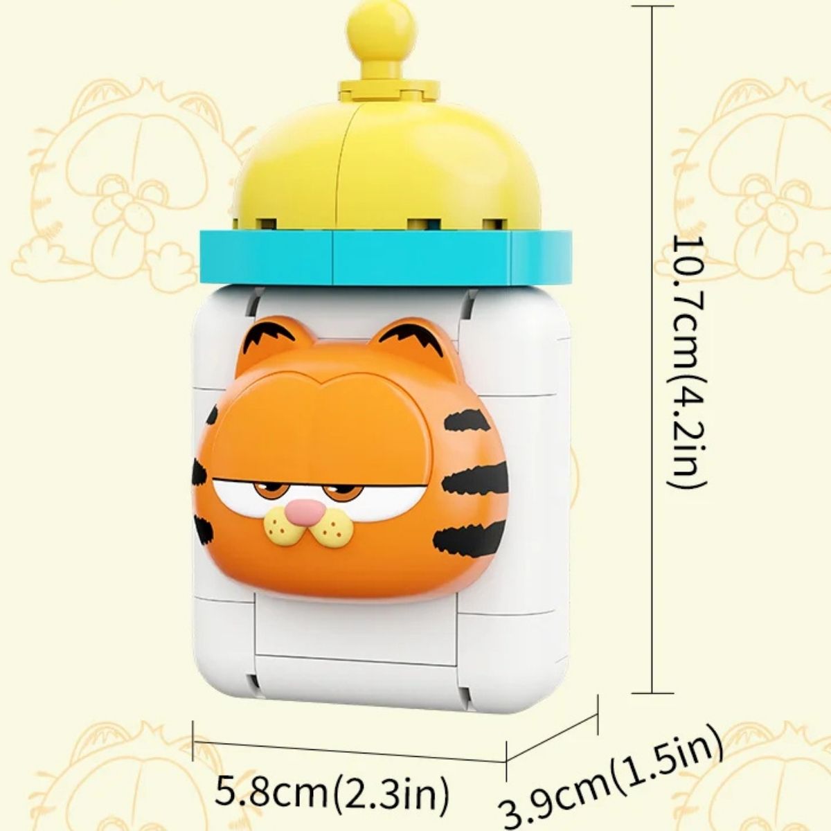 Dimension graphic for the Pantasy Garfield baby bottle magnet set showing it is 10.7cm tall, 5.8cm wide, and 3.9cm deep.