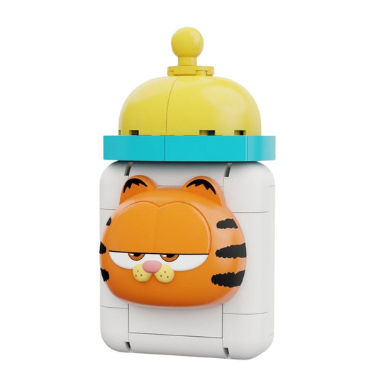 The fully assembled Pantasy The Garfield Movie baby bottle building block fridge magnet featuring a grumpy Garfield face.