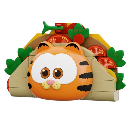 The fully assembled Pantasy The Garfield Movie taco building block fridge magnet featuring Garfield's face inside a loaded taco.