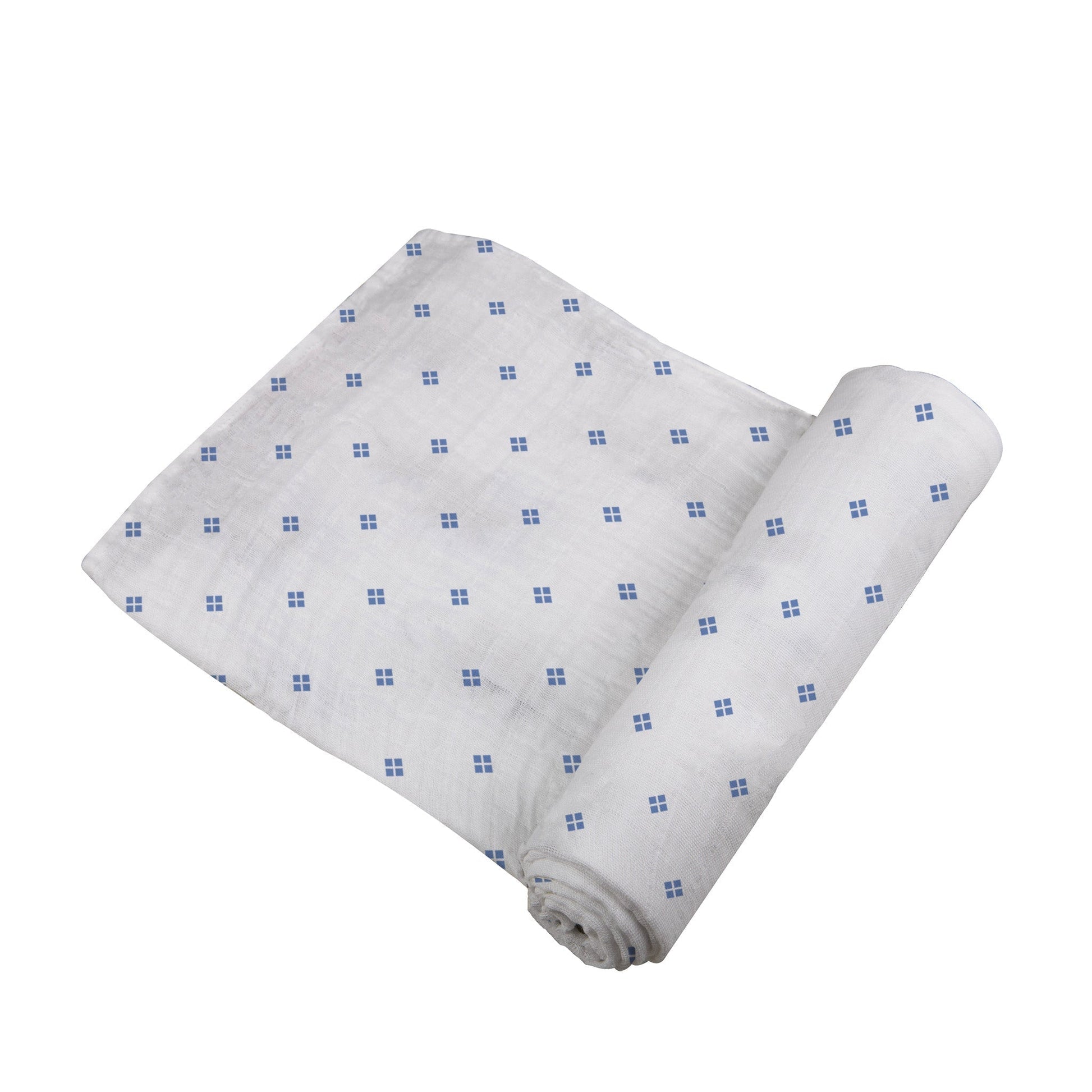 Angled view of the white swaddle blanket with small periwinkle blue diamond dots partially unrolled.