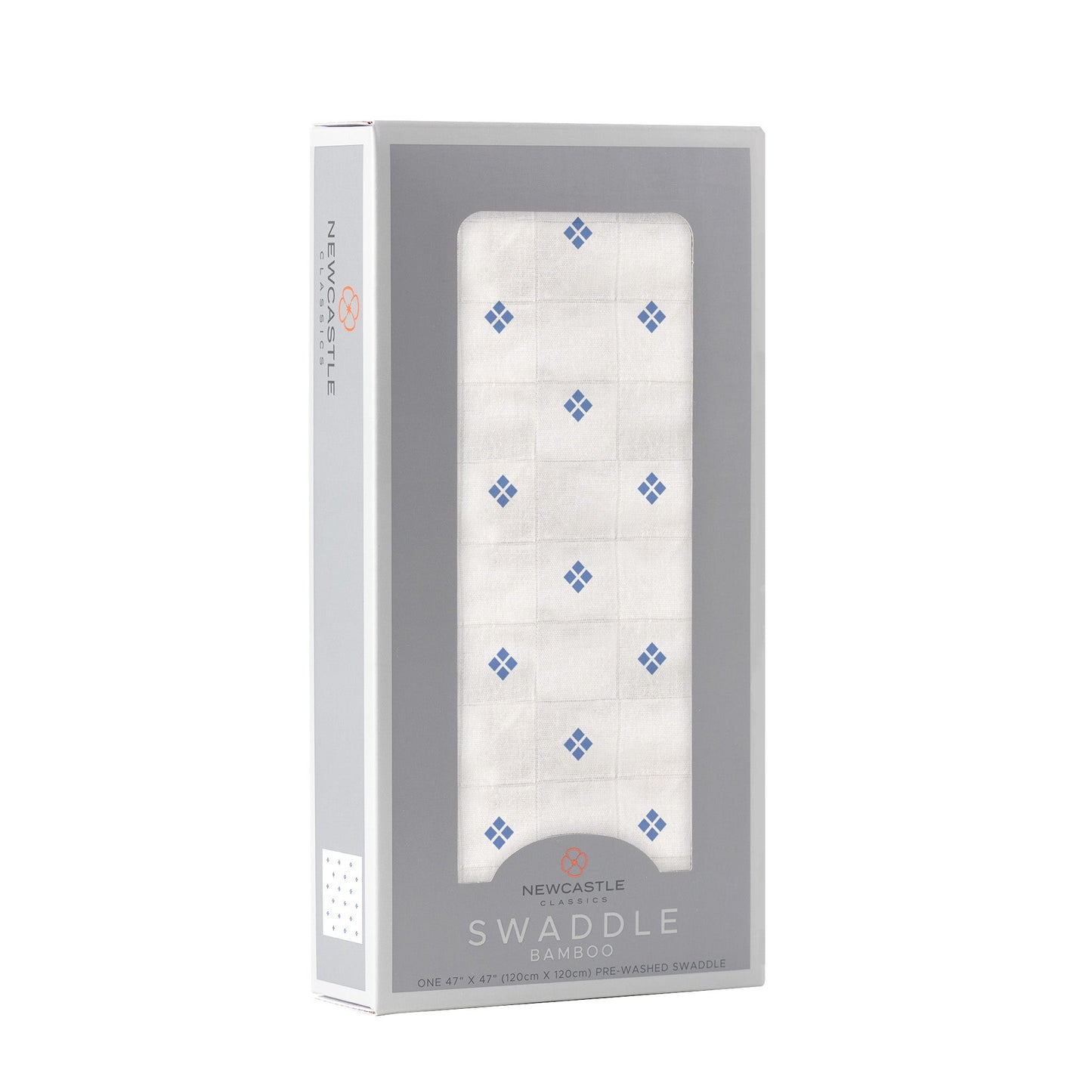 Angled front view of the Newcastle Classics baby swaddle blanket folded inside a light grey window display box.