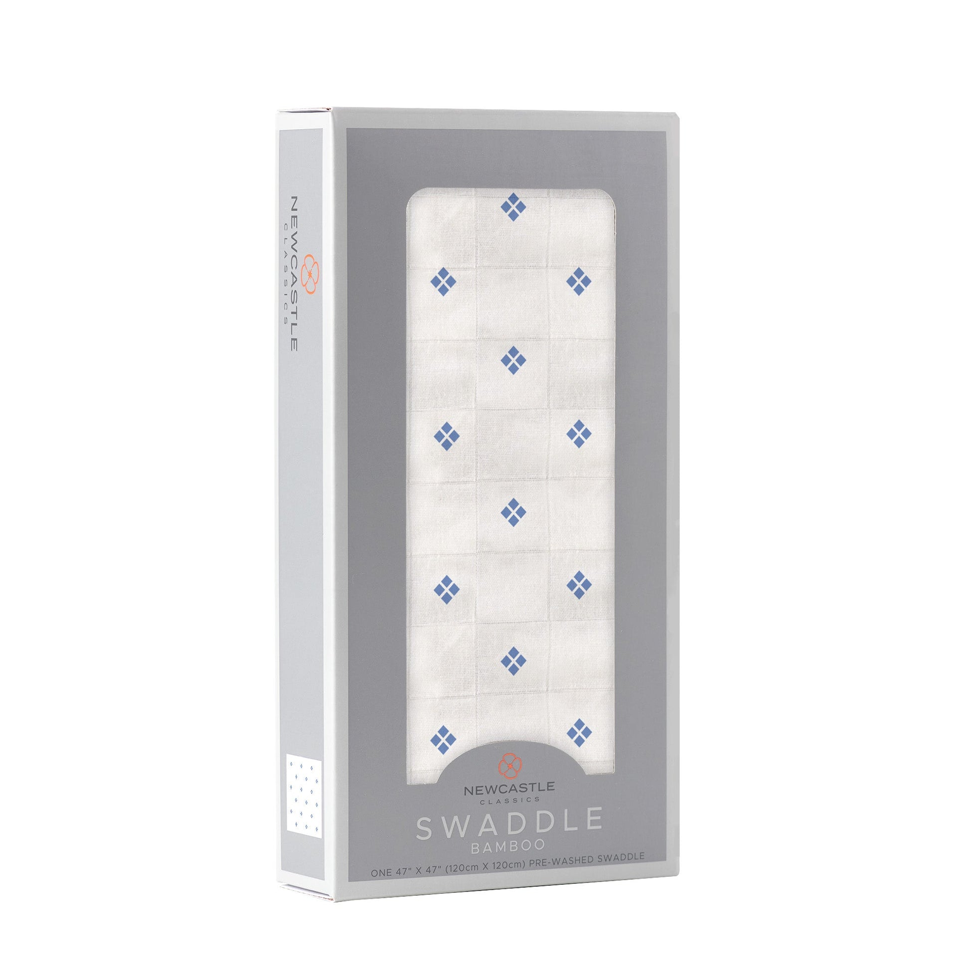 Angled front view of the Newcastle Classics baby swaddle blanket folded inside a light grey window display box.