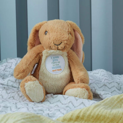 The 9-inch Little Nutbrown Hare plush beanbag toy sitting on a gray and white patterned baby blanket.