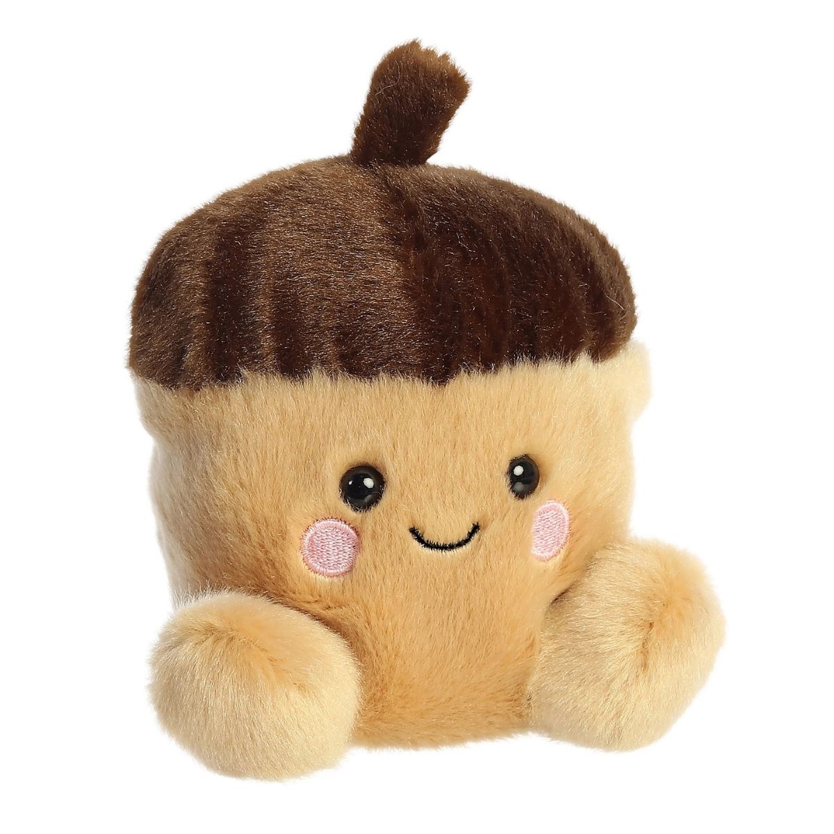 Aurora 5-inch Palm Pals Oak Acorn plush toy sitting at an angle showing its golden-tan body, textured dark brown acorn cap, small top stem, and sweet smiling face with rosy pink cheeks.