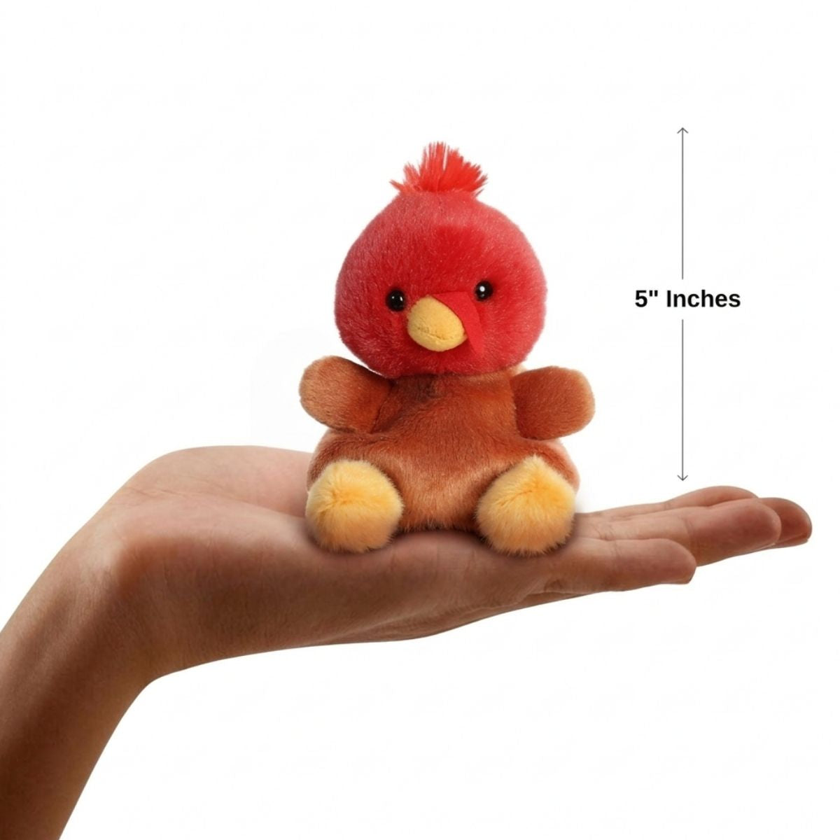 The miniature Aspen Turkey plush sitting balanced in an open human hand under a 5-inch height graphic indicator.