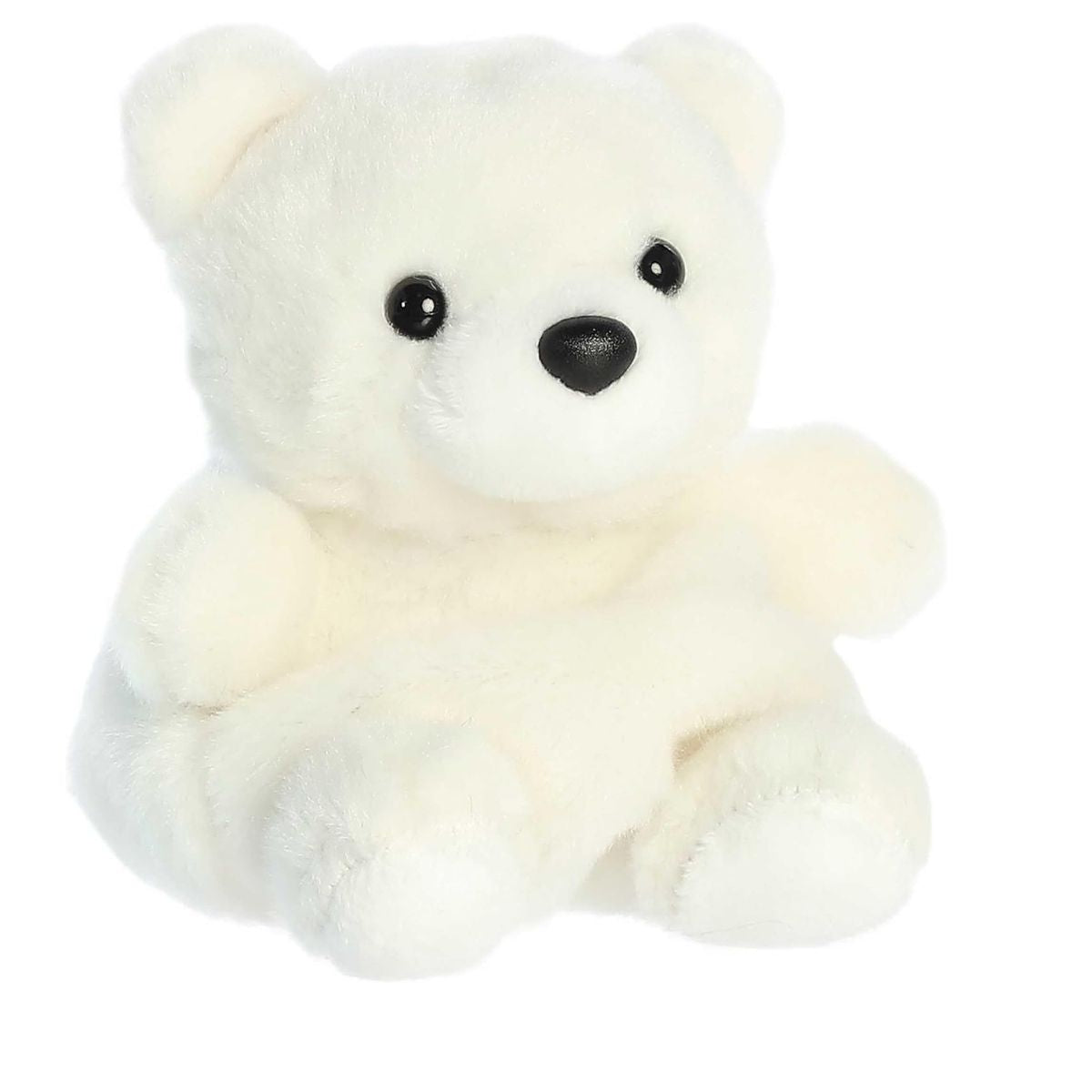 Angled front view of the 5-inch Aurora Palm Pals Puck Polar Bear white stuffed animal sitting upright.