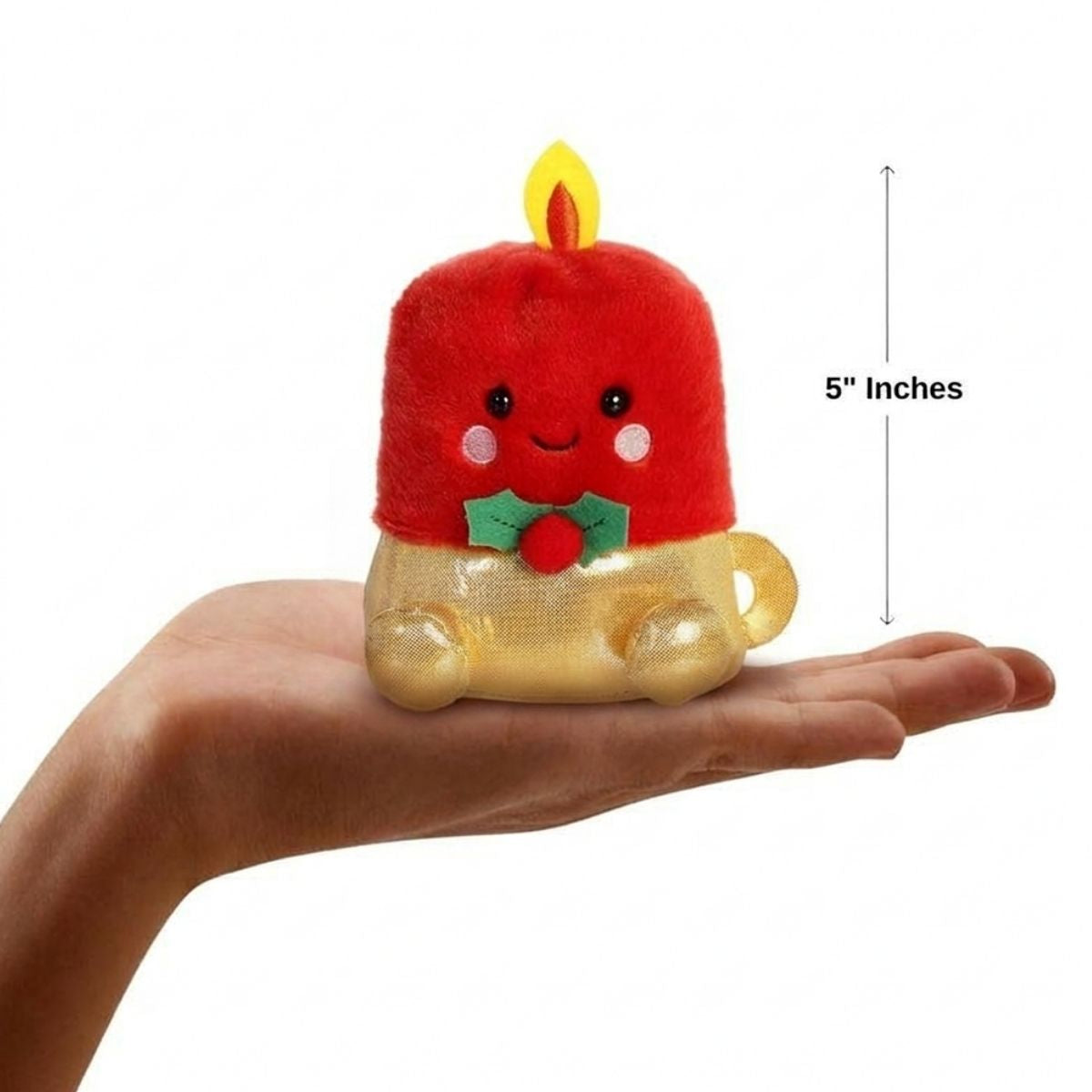 The miniature Luz Candle plush sitting balanced in an open human hand under a 5-inch height graphic indicator.