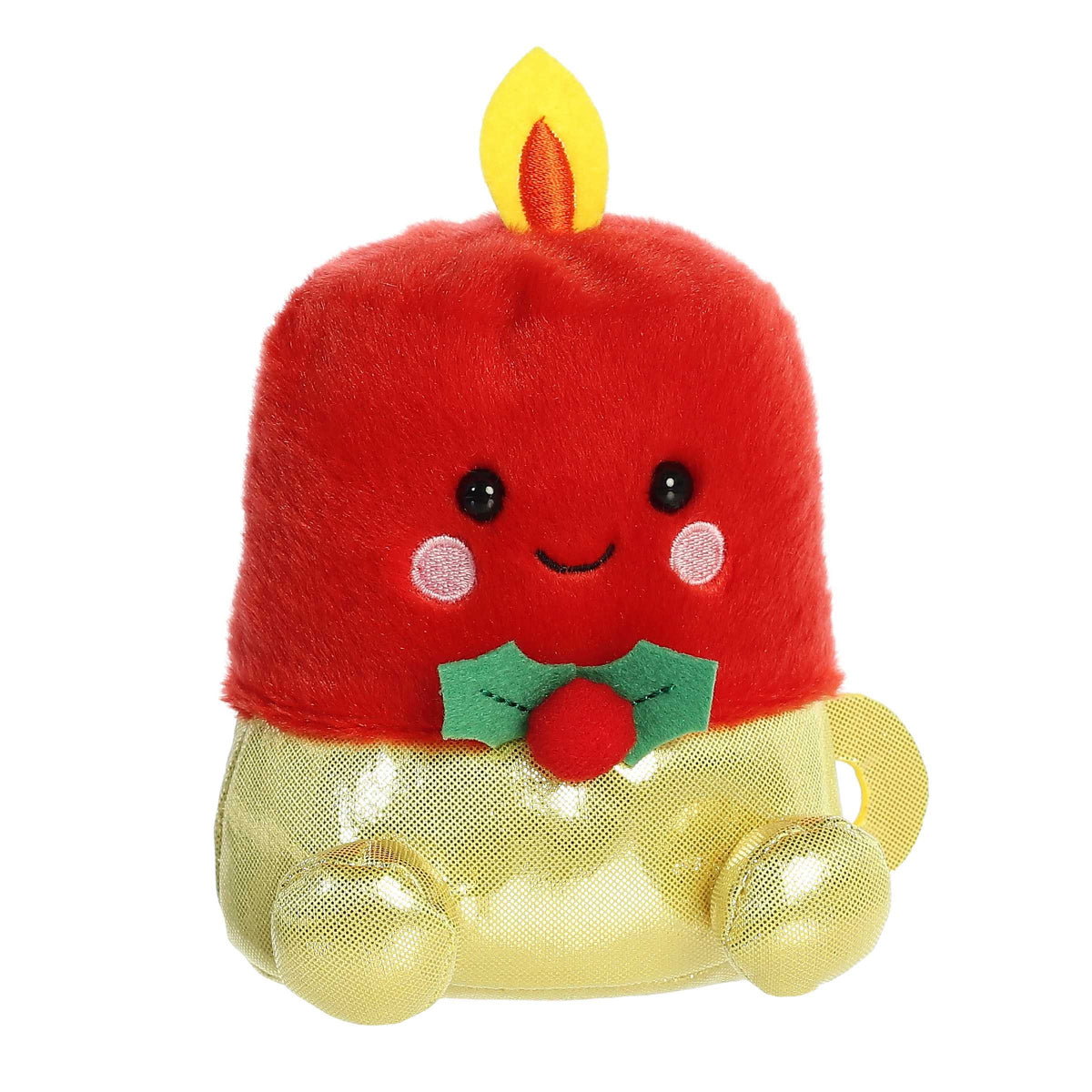 Aurora 5-inch Palm Pals Luz Candle plush toy showing its crimson-red candle body, vibrant yellow plush flame, shimmering metallic gold holder base, and green holly leaf accent.