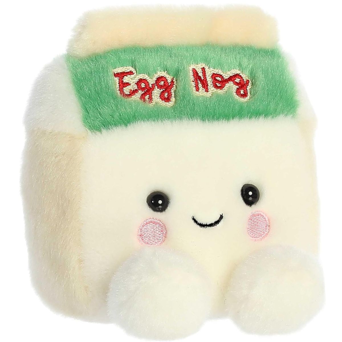 Aurora 5-inch Palm Pals Emery Eggnog plush toy shaped like a cream carton with a green banner reading "Egg Nog" in red embroidery and a cute smiling face.