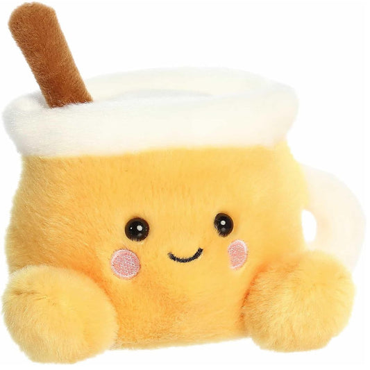 Aurora Palm Pals Mac 5-inch Apple Cider plush stuffed toy sitting forward with a golden-yellow mug body and a white whipped cream rim.