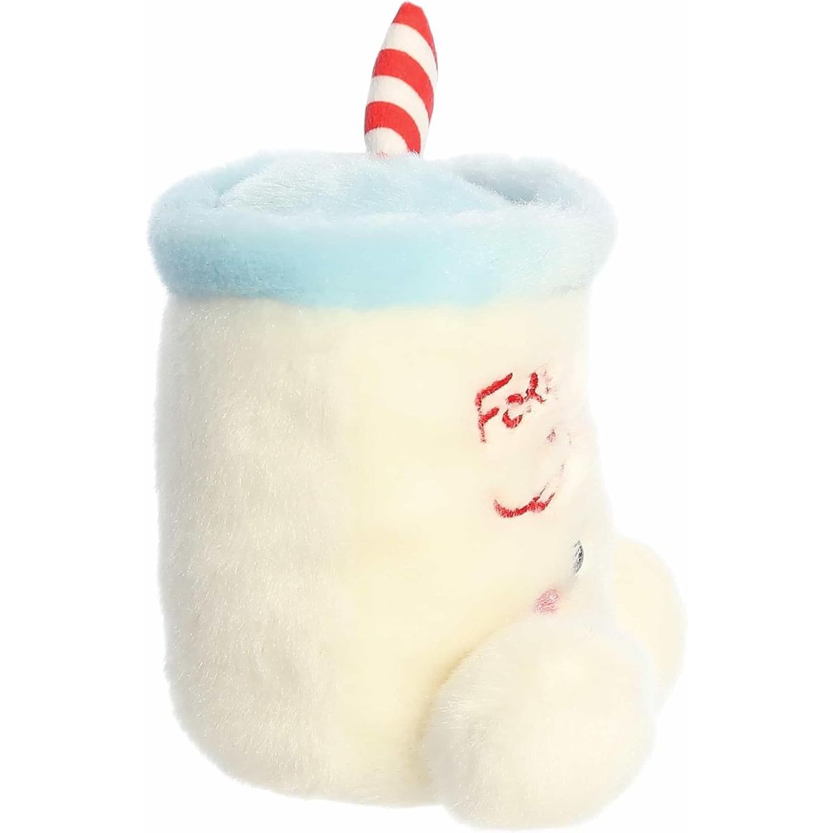The right side profile view of the sitting Aurora Palm Pals holiday milk plush highlighting its cylindrical mug shape.