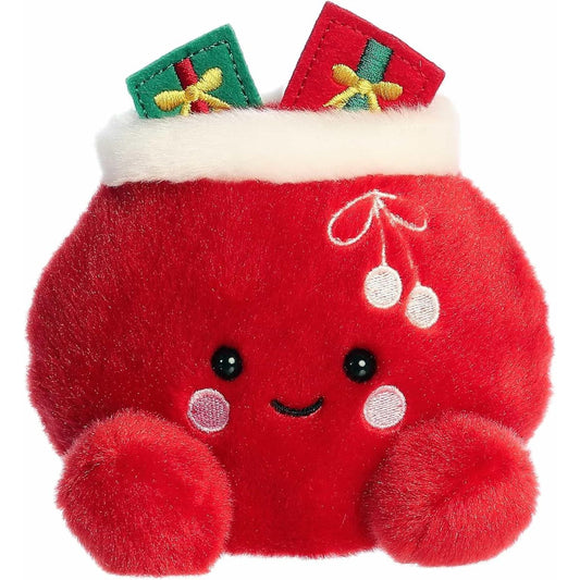 A direct front close-up shot of the mini Velvet Santa Bag plush showing its friendly smile, blushing cheeks, and embroidered drawstring bow.
