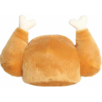 The rear view of the golden-brown Aurora turkey stuffed animal displaying its plump shape and white bone accents.