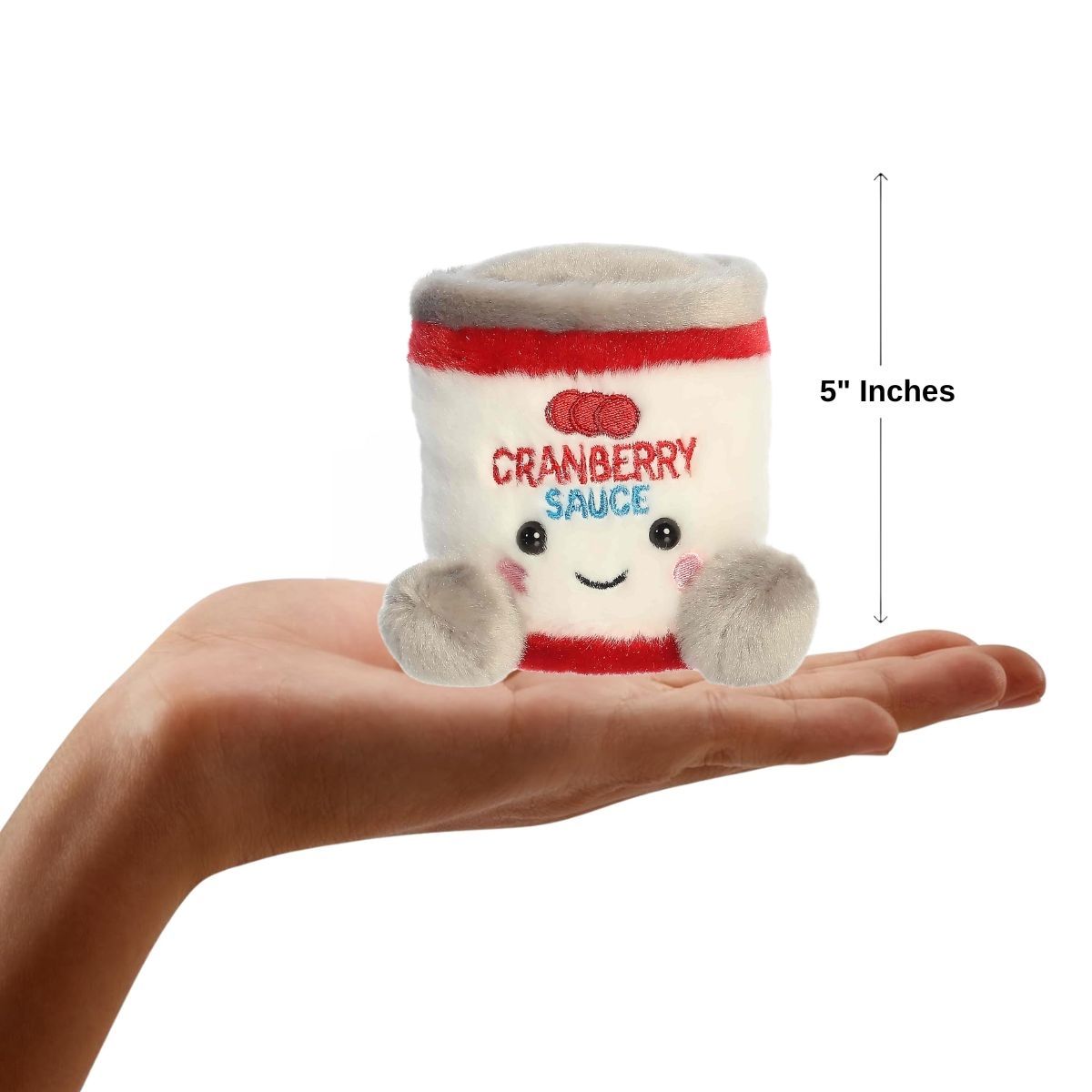 The miniature Quinn Cranberry Sauce plush sitting balanced in the palm of an open human hand under a 5-inch height graphic indicator.