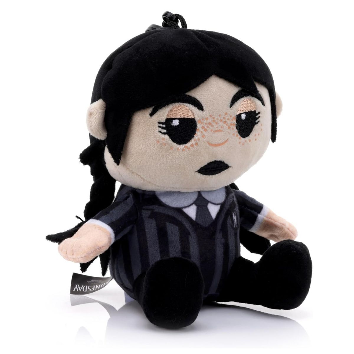 Angled left view of the Wednesday Addams plush Bluetooth speaker highlighting her braids and soft fabric body.