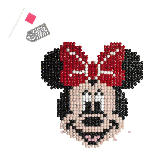 Minnie Mouse diamond painting design pattern alongside the included crafting tools: a stylus, pink wax, and a craft tray.