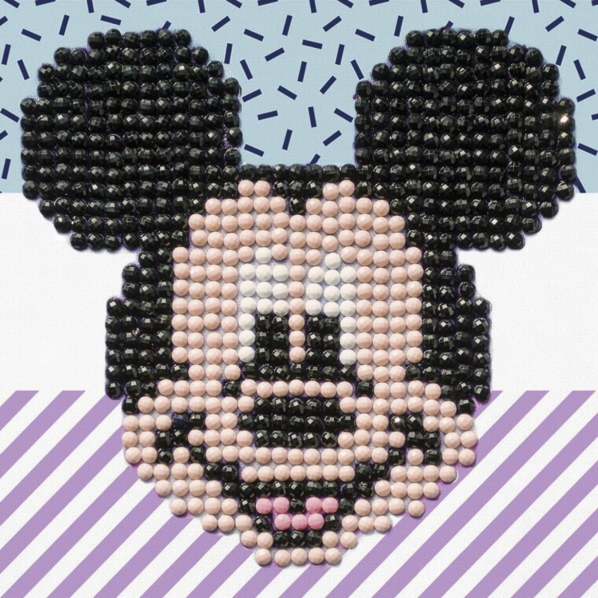 Finished Diamond Dotz Disney Mickey Mouse Fun diamond painting featuring Mickey's smiling face on a blue and purple patterned background.