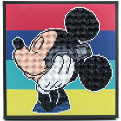 Finished DIAMOND DOTZ Box Disney Mickey Mouse Headphones diamond painting featuring Mickey listening to music on a colorful striped background.