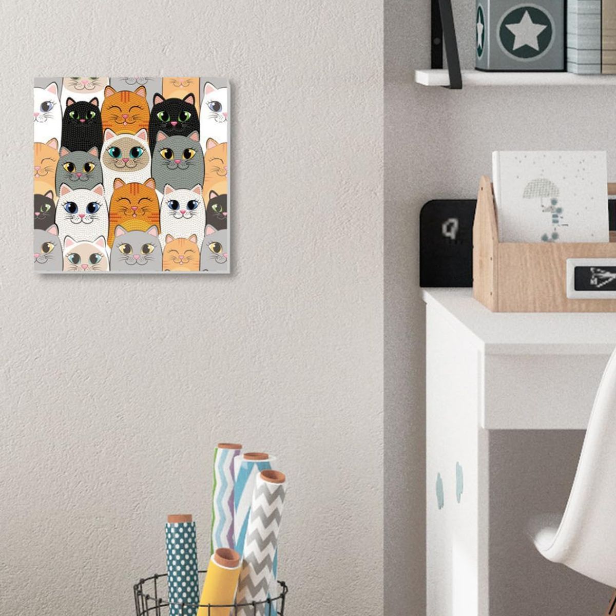 Completed Cat Clan diamond painting displayed as framed wall art in a modern home office space above a white desk.