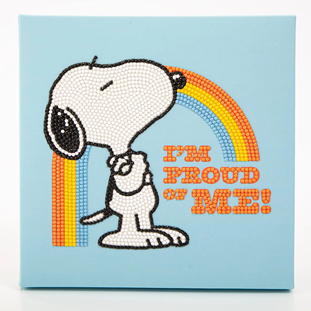 Angled view of the completed 8.7 by 8.7 inch Snoopy diamond painting showing its pre-mounted, ready-to-hang box frame design.