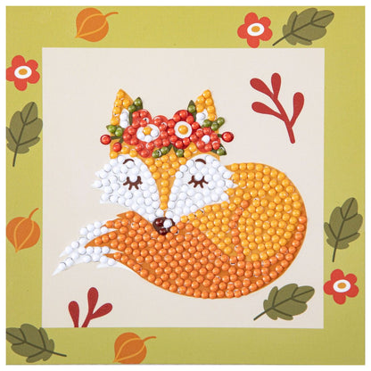 Finished DIAMOND DOTZ Forest Fox diamond painting featuring a sleeping fox with a flower crown and a green leafy border.