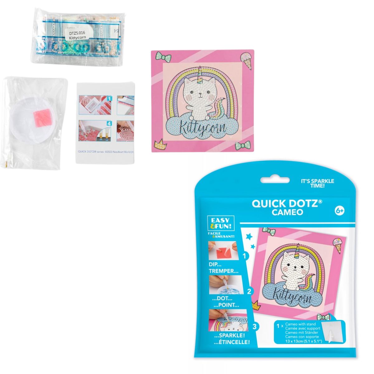 Contents of the DIAMOND DOTZ Quick DOTZ Kittycorn kit, including the canvas board, packaging, colorful diamond drills, and crafting tools.