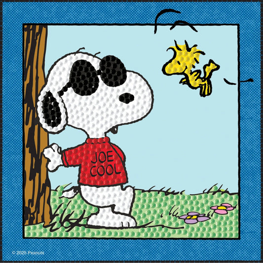 Finished Diamond Dotz Peanuts diamond painting featuring Snoopy as Joe Cool leaning against a tree with Woodstock flying nearby.