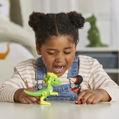 Lifestyle shot of a child making the Miles Morales and Electrosaurus toys interact on a playroom table.