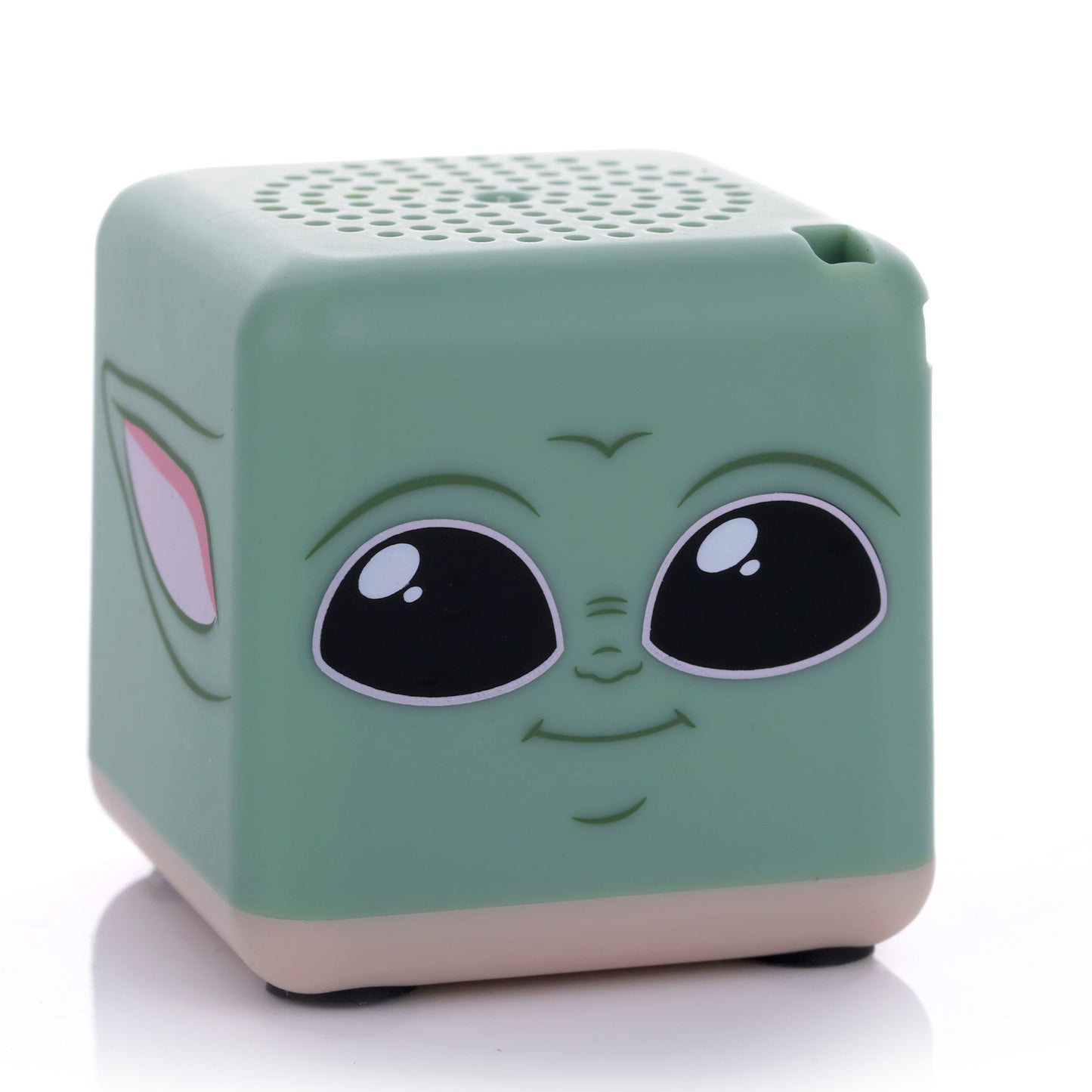 Front view of the green cube-shaped Bitty Boomers Star Wars Grogu Bitty Box mini Bluetooth speaker featuring his large black eyes and small smile.