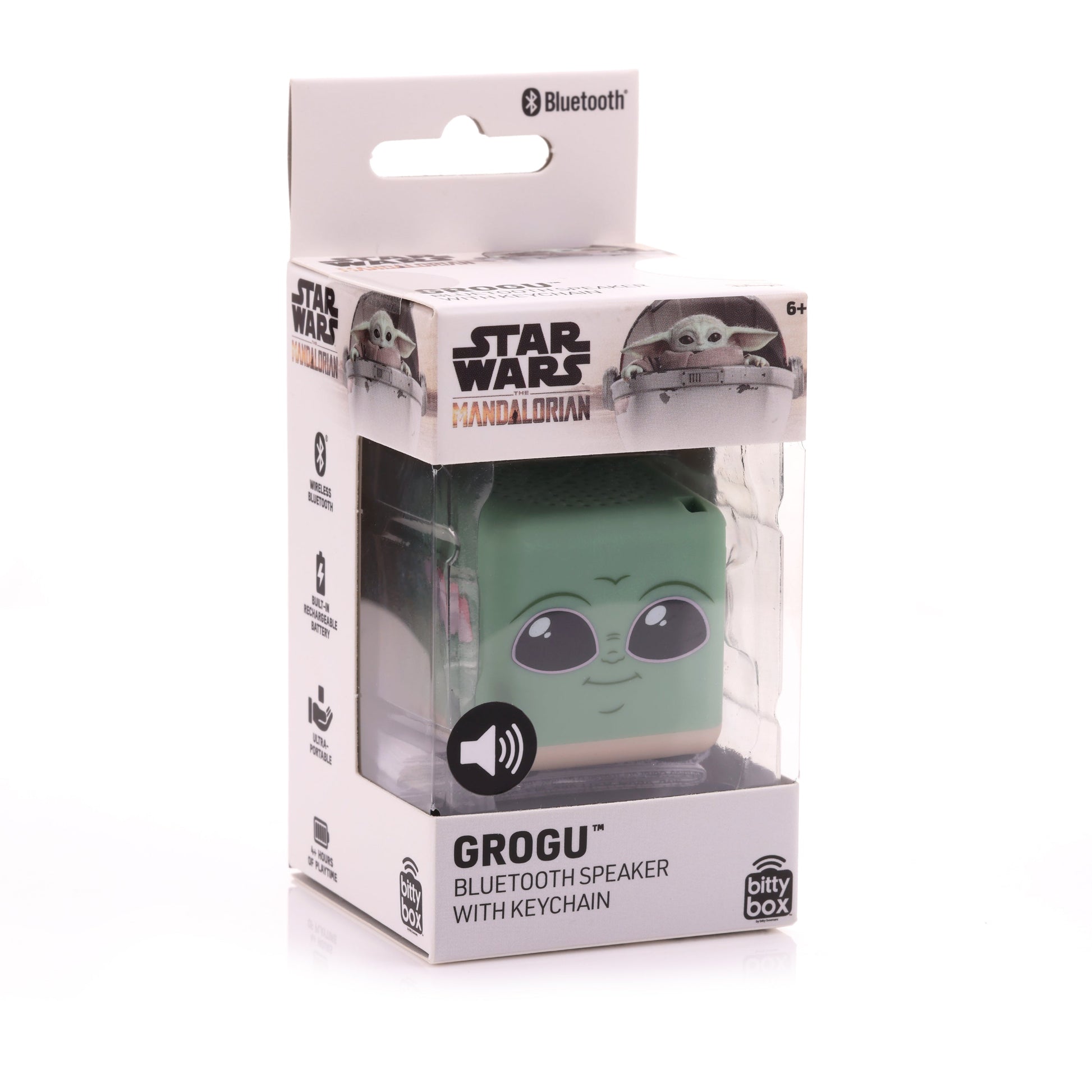 Front view of the Grogu Bitty Box mini Bluetooth speaker inside its official Star Wars The Mandalorian clear display packaging.