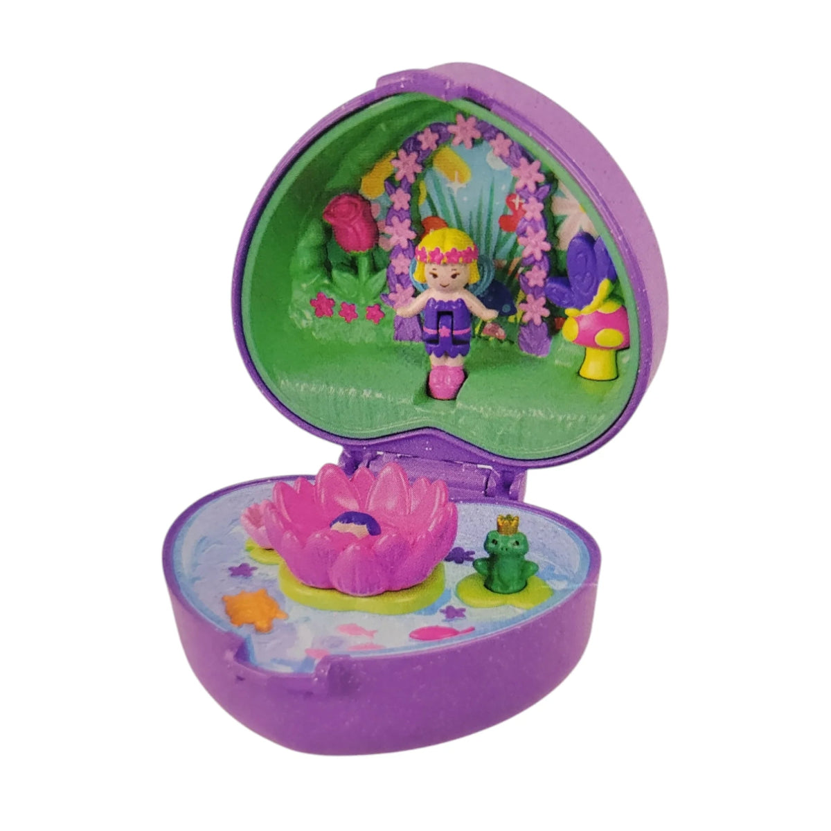 Toy set with a fairy figure, flowers, and a frog in a purple playset on a white background