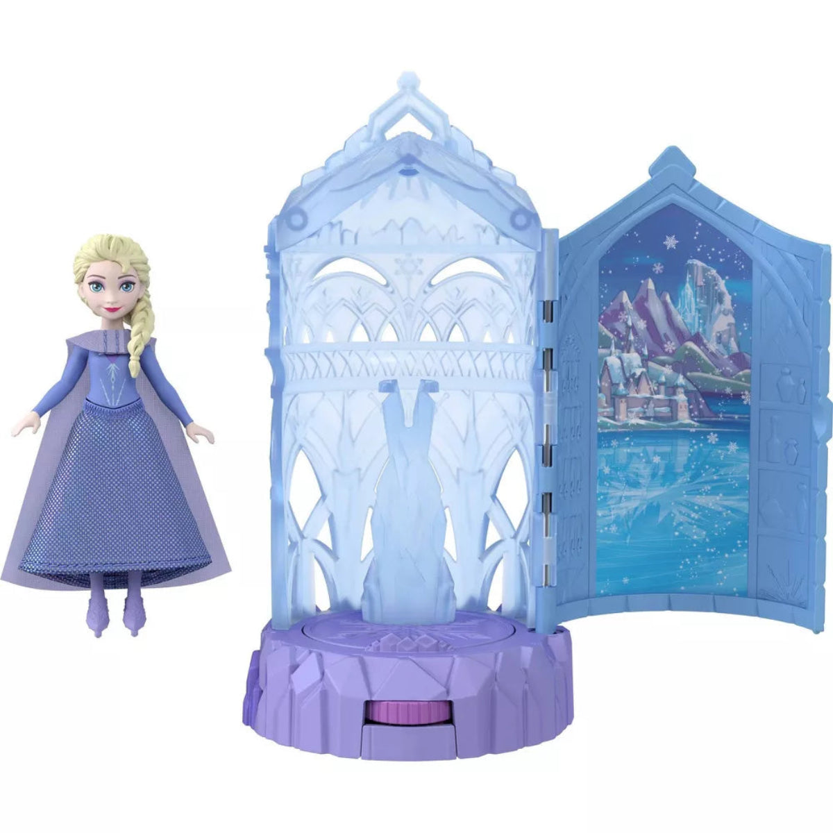 Frozen toy set with a doll and ice castle playset on a white background
