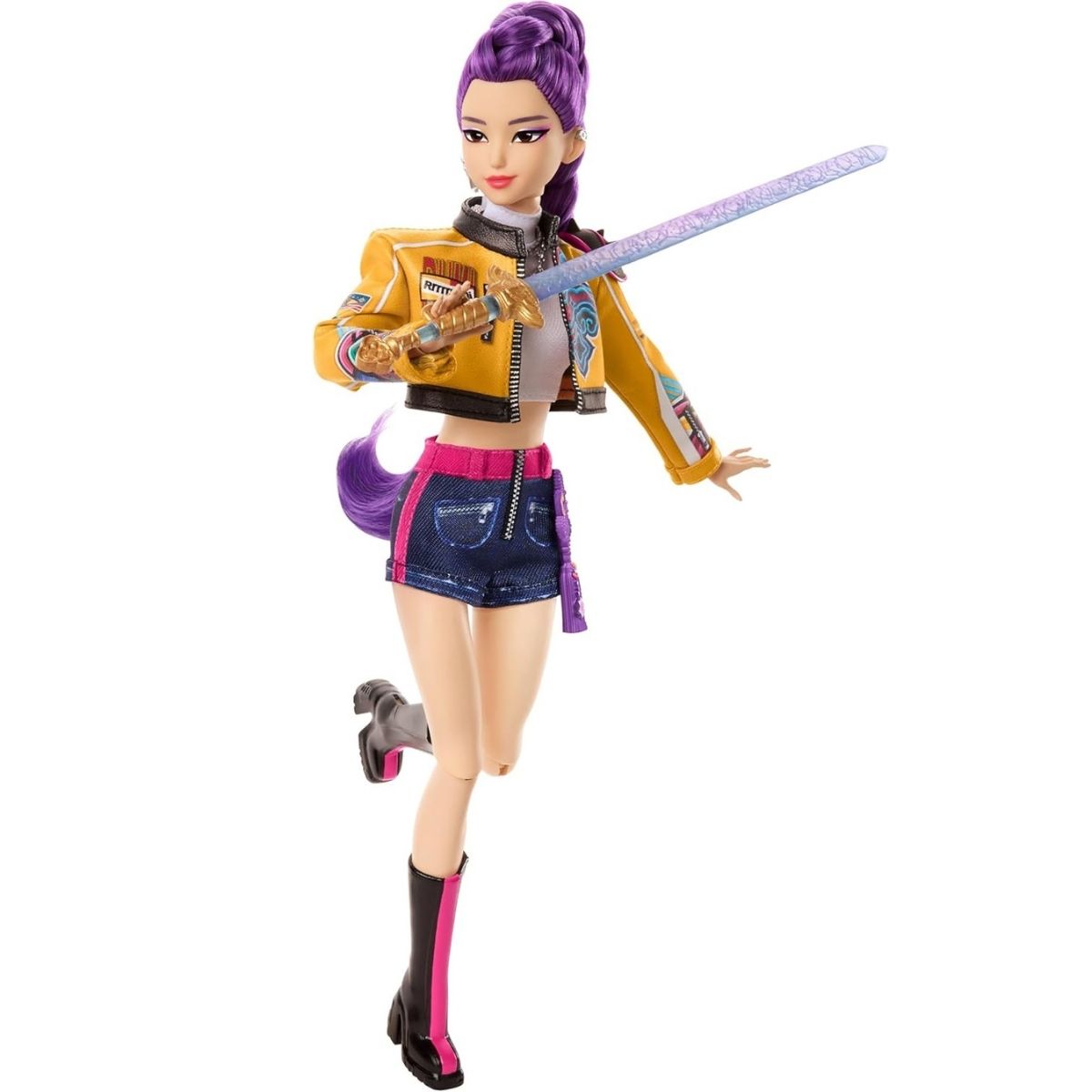 The articulated 12-inch K-Pop Demon Hunter Rumi doll in a dynamic mid-air jump pose wielding her glittering purple Spirit Sword.