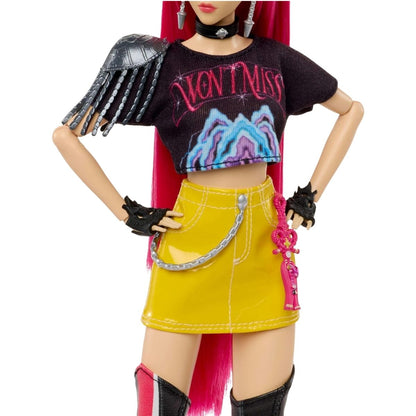 Torso view thumbnail showing the detail on Mira's black graphic cropped tee with fringe shoulder trim and yellow skirt with chain accents.