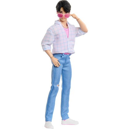 The articulated 12-inch K-Pop Demon Hunter Jinu doll wearing hot pink sunglasses in a dynamic walking pose.