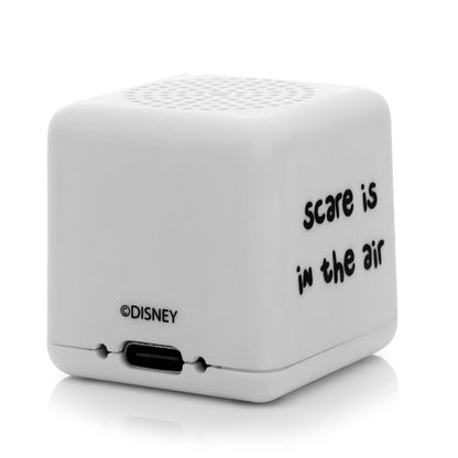 White electronic device with 'Disney' branding and text on a white background