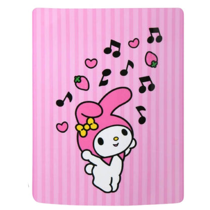 Full flat view of the Sanrio My Melody blanket featuring a pink striped background, floating musical notes, strawberries, and hearts.