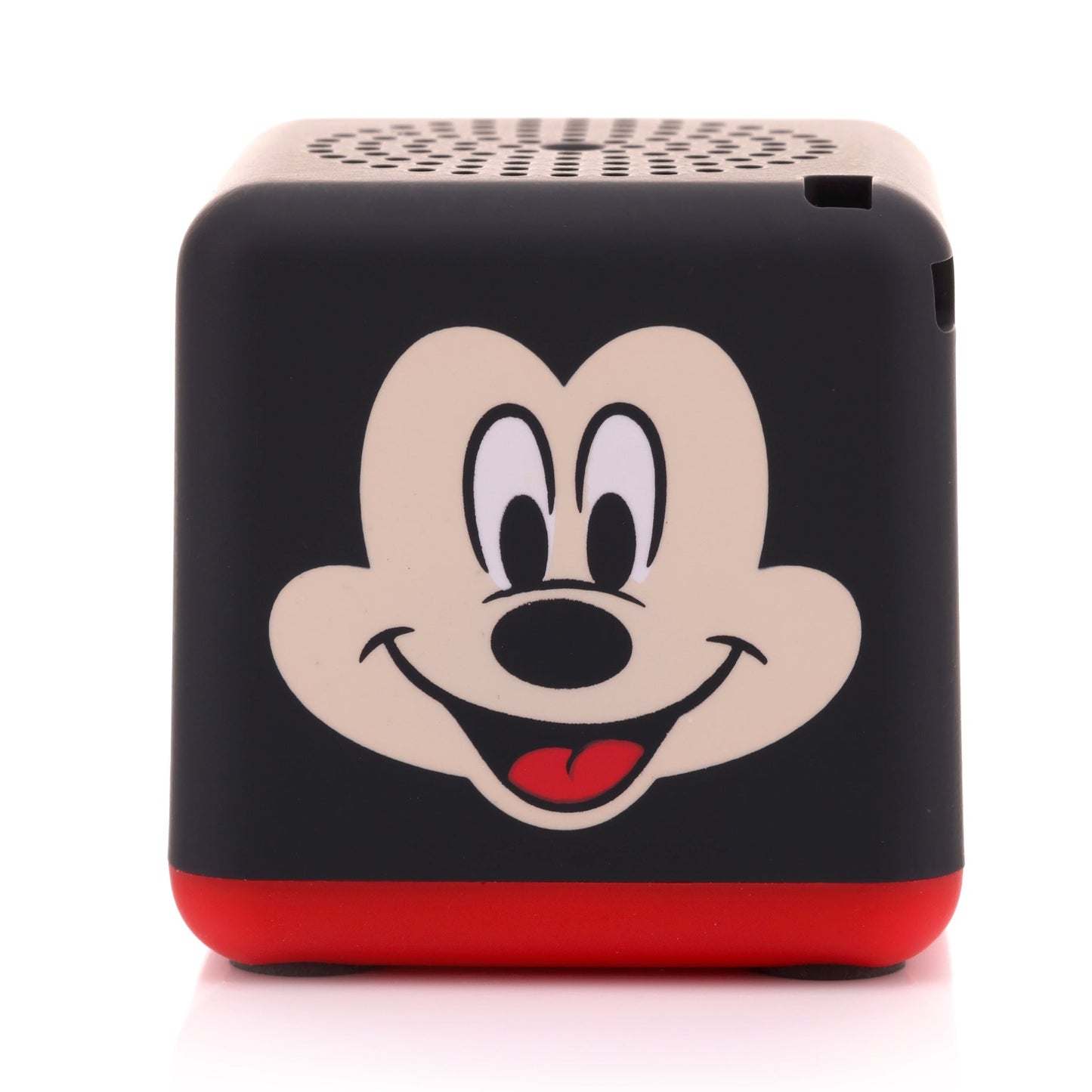 Angled front-right view of the cube-shaped Mickey Mouse mini speaker highlighting his iconic face and the top speaker grill.
