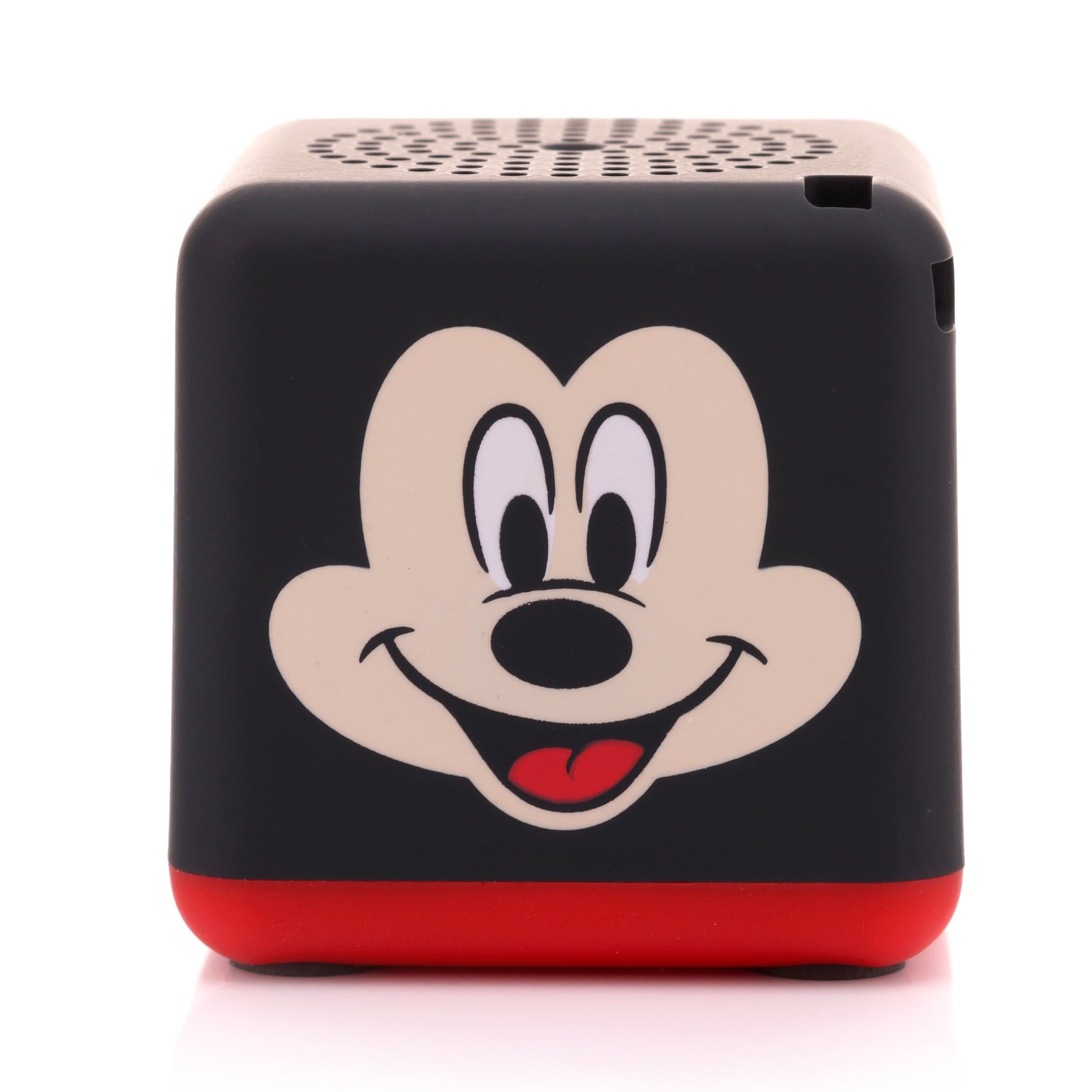 Angled front-right view of the cube-shaped Mickey Mouse mini speaker highlighting his iconic face and the top speaker grill.
