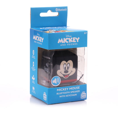 Front view of the Mickey Mouse Bitty Box mini Bluetooth speaker inside its official blue Disney display packaging.