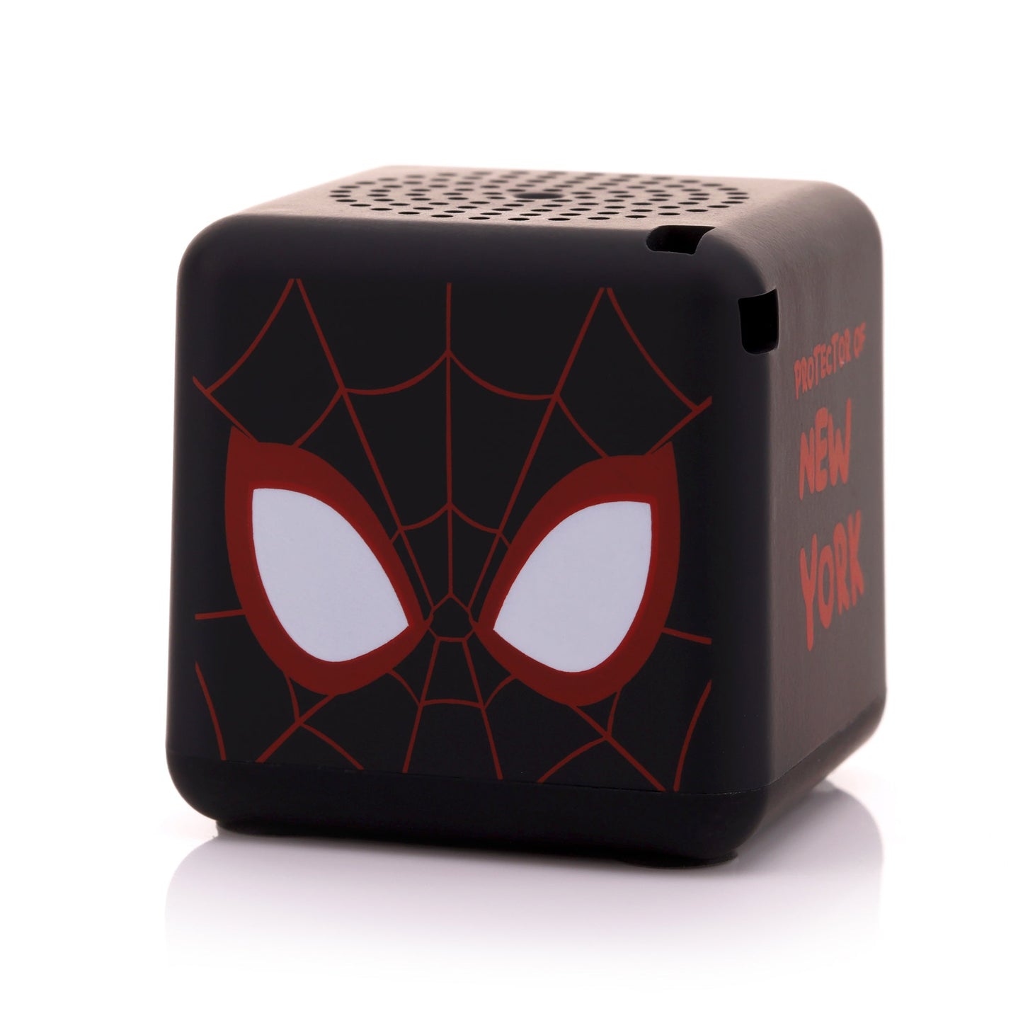 Angled front-right view of the cube-shaped Miles Morales mini speaker highlighting his mask and the top speaker grill.