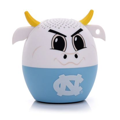 Slightly angled view of the North Carolina Tar Heels mini Bluetooth speaker highlighting the angry-cute ram face and top speaker grill.